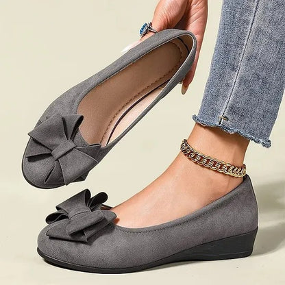 Women's Flat Shoes with Decorative Bow Details